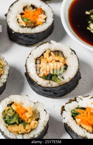Healthy Korean Tofu Kimbap Roll with Carrots and Spinach Stock Photo