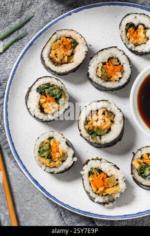 Healthy Korean Tofu Kimbap Roll with Carrots and Spinach Stock Photo