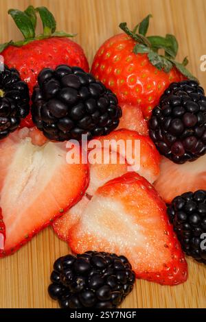 Fresh Strawberries and Blackberries, chopped and covered in cream Stock Photo