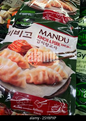 Frozen Mandu kimchi and pork dumplings by Bibigo in supermarket freezer, Bibigo dumplings, Asian cuisine, consumerism, shopping Stock Photo