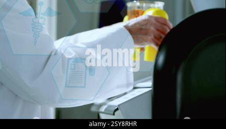 Image of medical icons over caucasian scientist doing experiment in lab Stock Photo