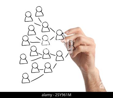 Man drawing family tree on virtual screen against white background. Scheme with human figures Stock Photo