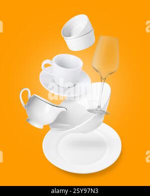 Clean dishware and silverware flying over napkin on orange background Stock Photo