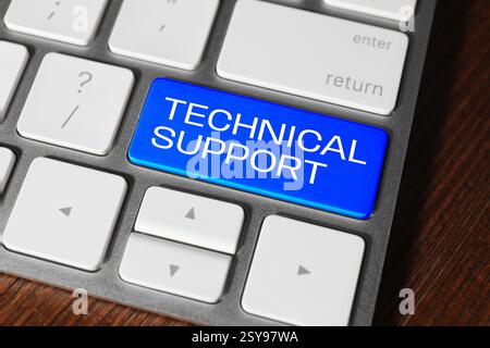 Technical Support button blue on computer keyboard, closeup Stock Photo