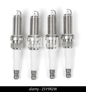 Four iridium spark plugs in a row isolated on white background with clipping path Stock Photo