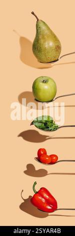 Collage of fresh fruits and vegetables. Paprika, tomatoes, pear, apple, lettuce, arugula leaves, beet leaves. Fresh fruits and vegetables isolated. Stock Photo