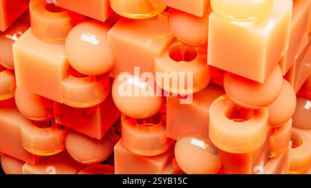 An engaging array of 3D geometric shapes in fiery orange tones combines spheres and cubes, creating a dynamic and visually stimulating design. Stock Photo