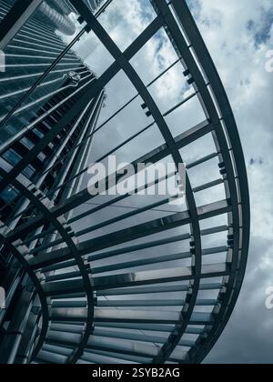 abstract steel architecture structure against overcast sky Stock Photo