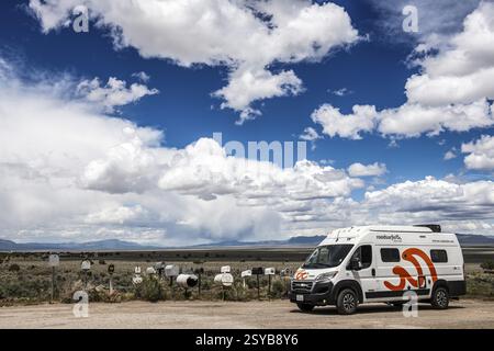 Letterboxes, mailboxes, cumulus clouds Highway 50, Loneliest Road in America, Ely, Nevada, USA, North America Stock Photo