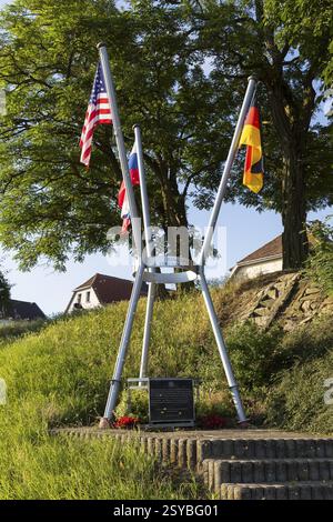 Flags at the memorial commemorating the first encounter between Russian and American troops in April 1945 at the end of the Second World War, ferry pi Stock Photo