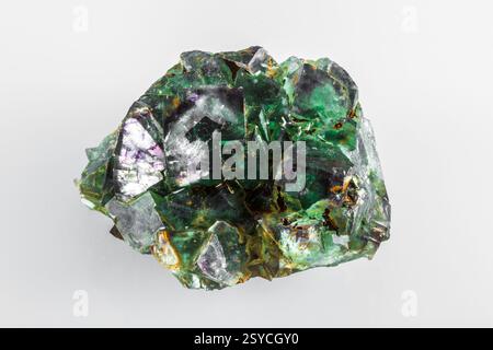 Green rock with purple and gold speckles. It is a type of crystal. It is very large Stock Photo
