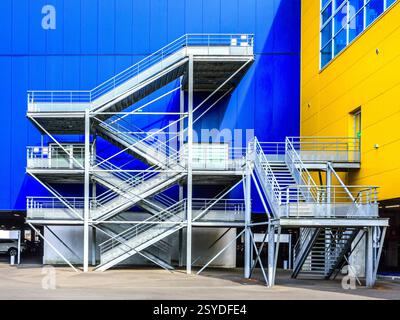 Multistory exterior metal staircase on side of IKEA warehouse / superstore in Tours, Indre-et-Loire (37), France. Stock Photo