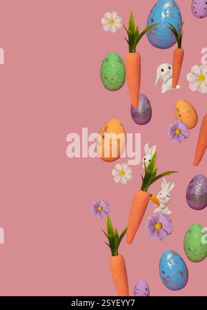 Easter layout made with carrots, eggs, flowers and bunnies on pastel pink background. Creative minimal holiday concept. Stock Photo