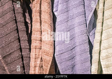 beige, red, green towels with a large background Stock Photo