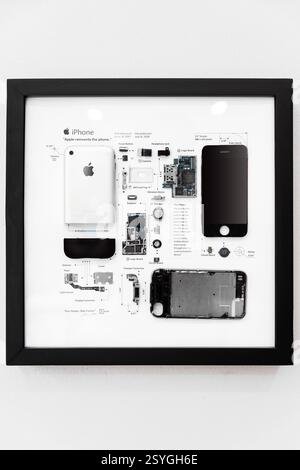 Bangkok Thailand - February 20, 2025: Disassembled broken Apple iPhone components preparing to repair or replace new part on white background. Stock Photo