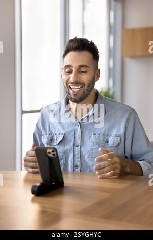 Man recording new video for channel using smartphone Stock Photo