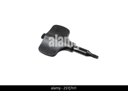 A black T-handle Torx wrench with a star-shaped tip, isolated on a white background, commonly used for tightening or loosening screws with a Torx head Stock Photo