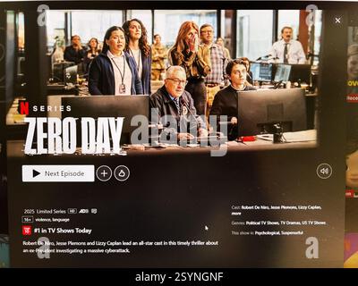 Kyiv, Ukraine - February 27, 2025: Zero Day on Netflix. Team of experts at workstation during intense focus on solving critical issue Stock Photo