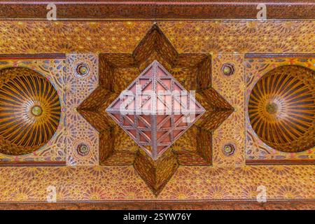 breathtaking ceiling adorned with intricate geometric patterns and a ...