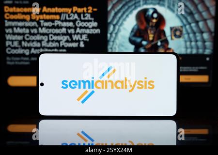 Smartphone displaying the SemiAnalysis logo, reflecting on a dark surface. Background features a tech article about datacenter cooling systems and AI Stock Photo