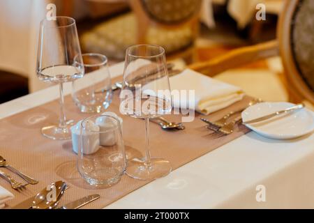 Luxury table settings for fine dining in romantic LUXURY Restaurant.  For events, weddings and celebration. Stock Photo