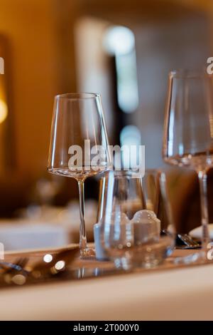 Luxury table settings for fine dining in romantic LUXURY Restaurant.  For events, weddings and celebration. Stock Photo