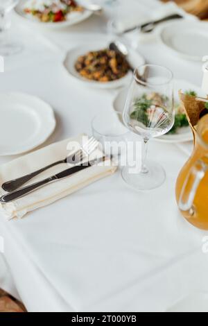 Luxury table settings for fine dining in romantic LUXURY Restaurant.  For events, weddings and celebration. Stock Photo