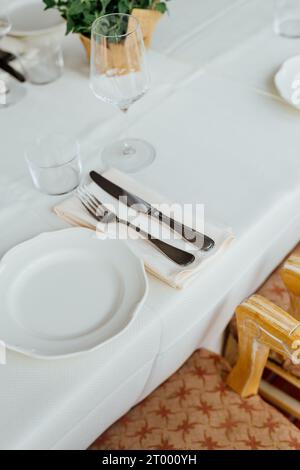 Luxury table settings for fine dining in romantic LUXURY Restaurant.  For events, weddings and celebration. Stock Photo