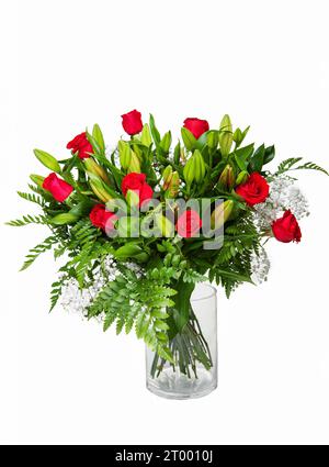 Beautiful huge bouquet of red roses in vase isolated on white background. Stock Photo