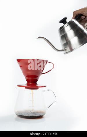 Serves coffee with a V60 dripper coffee maker on a white background Stock Photo