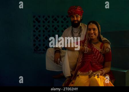 Portrait Of Happy Rajasthani Couple Sitting Together On Stairs Stock 