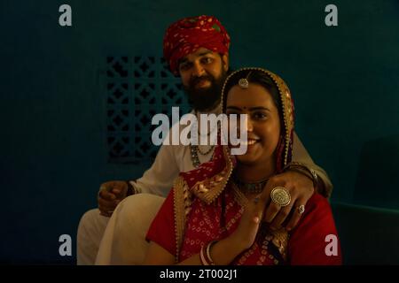 Portrait Of Happy Rajasthani Couple Sitting Together On Stairs Stock 