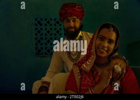 Portrait Of Happy Rajasthani Couple Sitting Together On Stairs Stock 