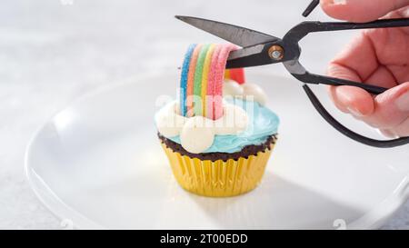 Unicorn rainbow chocolate cupcake Stock Photo