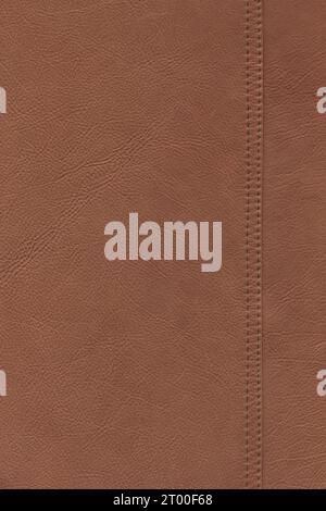 Terracotta calf leather texture. The skin is bovine with stitching Stock Photo