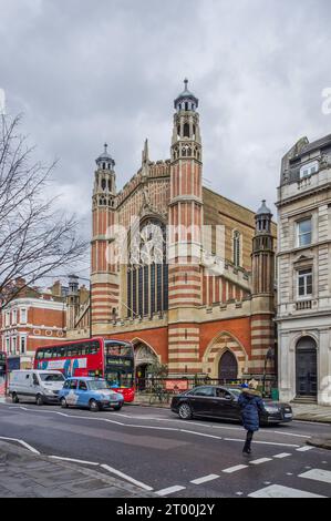 Holy Trinity church viewed from Sloane Street, London; built 1890 in the Arts and Crafts style by the architect John Dando Sedding. Stock Photo