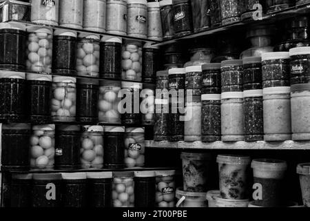 A market stall selling pickled olives preserved in olive oil, in Fes el Bali, in city of Fez, Morocco, North Africa Stock Photo