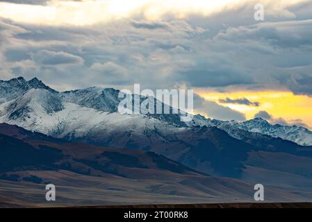 Snowy mountain ranges in Kyrgyzstan Stock Photo