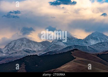 Snowy mountain ranges in Kyrgyzstan Stock Photo