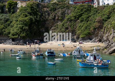 Fishing boats moored in the picturesque Newquay Harbour in Cornwall in England in the UK. Stock Photo