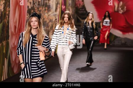 Paris, France. 3rd Oct, 2023. Models present creations by French fashion house Chanel as part of its Spring/Summer 2024 ready-to-wear collections during the Paris Fashion Week in Paris, France, on Oct. 3, 2023. Credit: Gao Jing/Xinhua/Alamy Live News Stock Photo