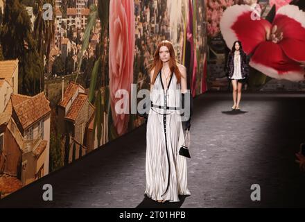 Paris, France. 3rd Oct, 2023. Models present creations by French fashion house Chanel as part of its Spring/Summer 2024 ready-to-wear collections during the Paris Fashion Week in Paris, France, on Oct. 3, 2023. Credit: Gao Jing/Xinhua/Alamy Live News Stock Photo