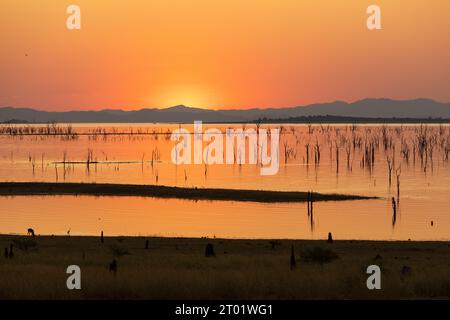 A beautiful sunset over Lake Kariba in Zimbabwe, taken from the Matusadona National Park Stock Photo