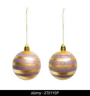 Golden baubles with violet stripes for Christmas tree decoration on white background with clipping path Stock Photo