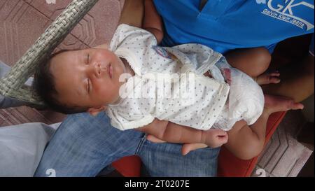 3 October 2023 Dhaka, Bangladesh. The newborn baby is sleeping Stock Photo