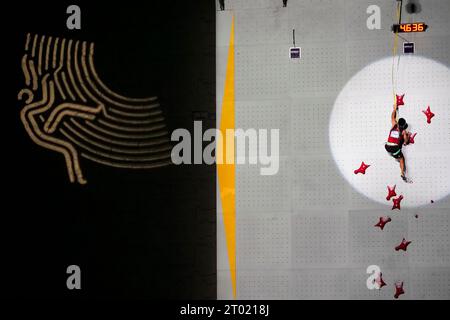 Shaoxing, China's Zhejiang Province. 3rd Oct, 2023. Long Jinbao of China competes during the Men's Speed Match of Sports climbing at the 19th Asian Games in Shaoxing, east China's Zhejiang Province, Oct. 3, 2023. Credit: Weng Xinyang/Xinhua/Alamy Live News Stock Photo