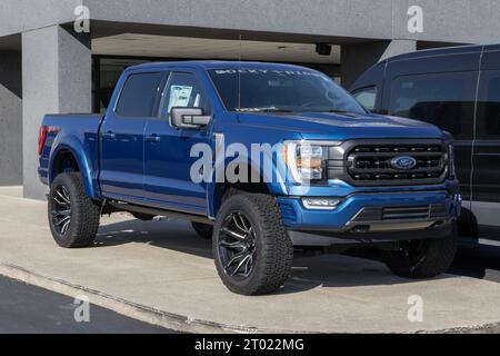 Zionsville - October 1, 2023: Ford F-150 Rocky Ridge model. Ford offers the F150 Rocky Ridge as a Custom Off-road 4x4 F-Series with upgraded suspensio Stock Photo