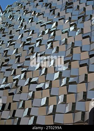kaleidoscopic details of angular 3D cladding on modern high-rise city centre building in evening light in Sheffield, Yorkshire, England, UK Stock Photo