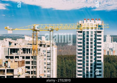 Amazing Bright Blue Sky Above Construction Crane. New Accommodation Concept. Construction And Development Of New Multi-storey Residential. Conception Stock Photo
