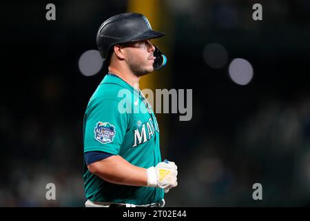 Seattle Mariners' Ty France looks down after striking out to end